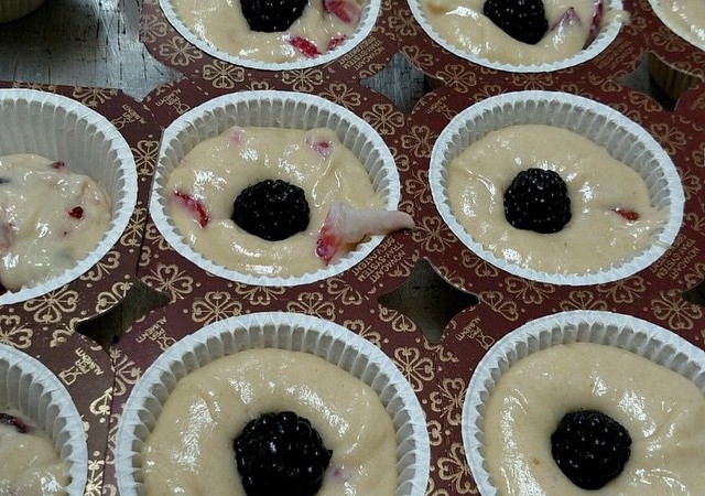 Strawberry- blackberry muffins gong in to the oven!
