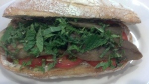 Tahini, roasted garlic, grilled eggplant and mint on acme roll